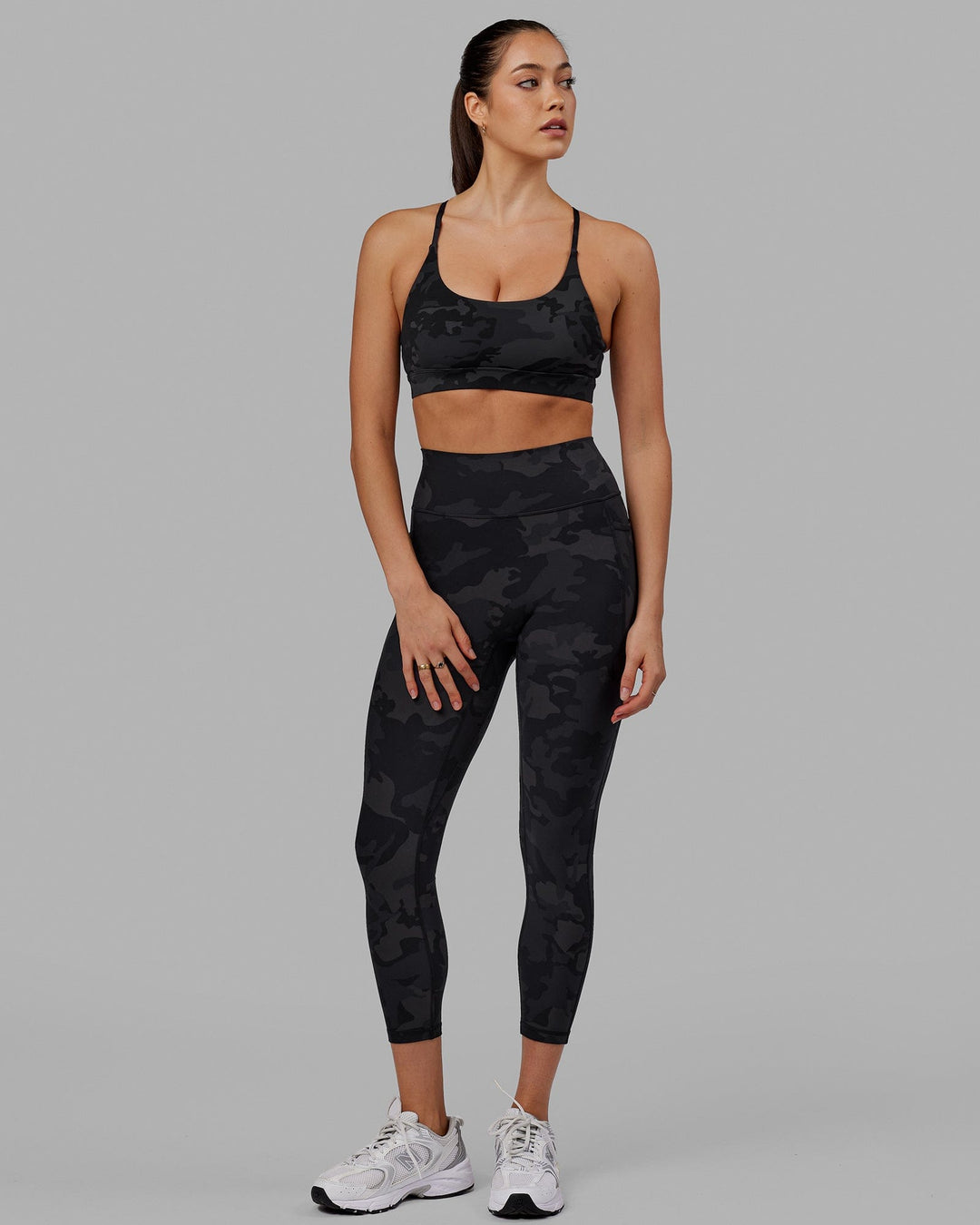 Woman wearing Fusion 7/8 Length Tight - Black-Camo
