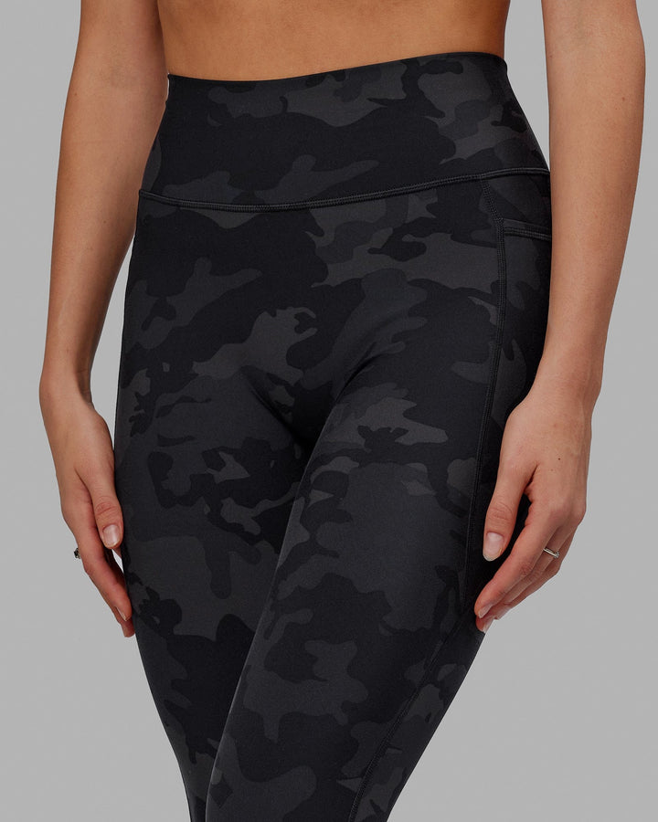 Woman wearing Fusion 7/8 Length Tight - Black-Camo