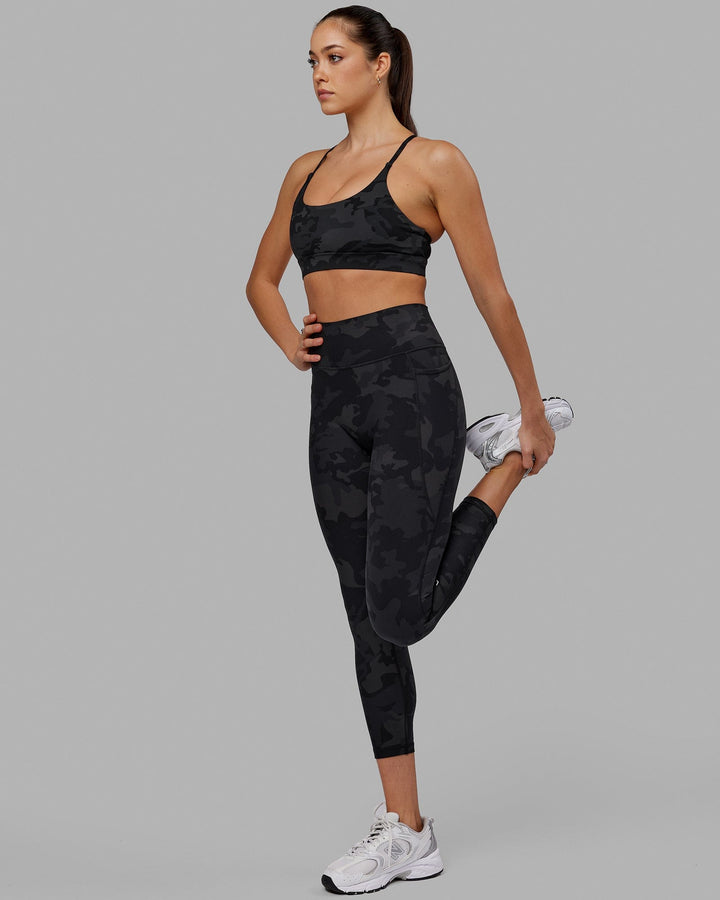 Woman wearing Fusion 7/8 Length Tight - Black-Camo