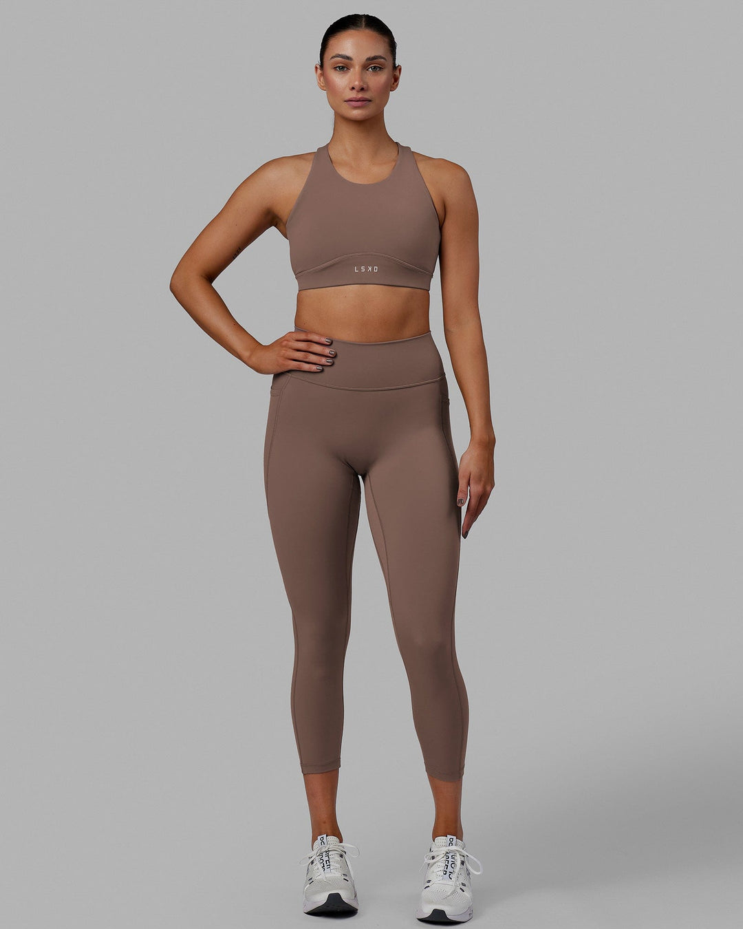 Woman wearing Fusion 7/8 Length Tight - Deep Taupe