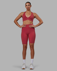 Woman wearing Fusion Ultra High-Rise 9" Short Pockets - Claret | Model:Blaize | Size:S