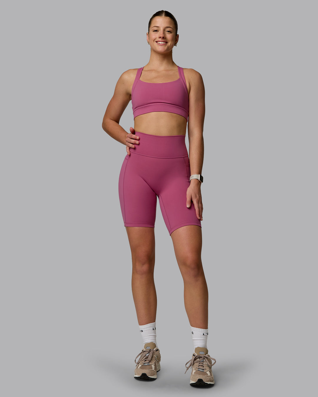 Woman wearing Fusion Ultra High-Rise 9&quot; Short Pockets - Mauve Haze | Model:Chloe | Size:XS