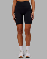 Woman wearing Fusion Ultra High-Rise 9" Short Pockets - Black | Model:Kirstyn | Size:S | Thumbnail Index: 5