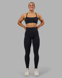 Woman wearing Fusion Ultra High-Rise Full Length Legging Pockets - Black | Model:Georgia | Size:S