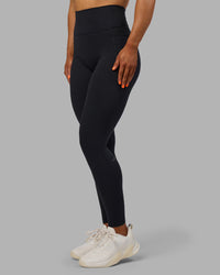Woman wearing Fusion Ultra High-Rise Full Length Legging Pockets - Black | Model:Georgia | Size:S
