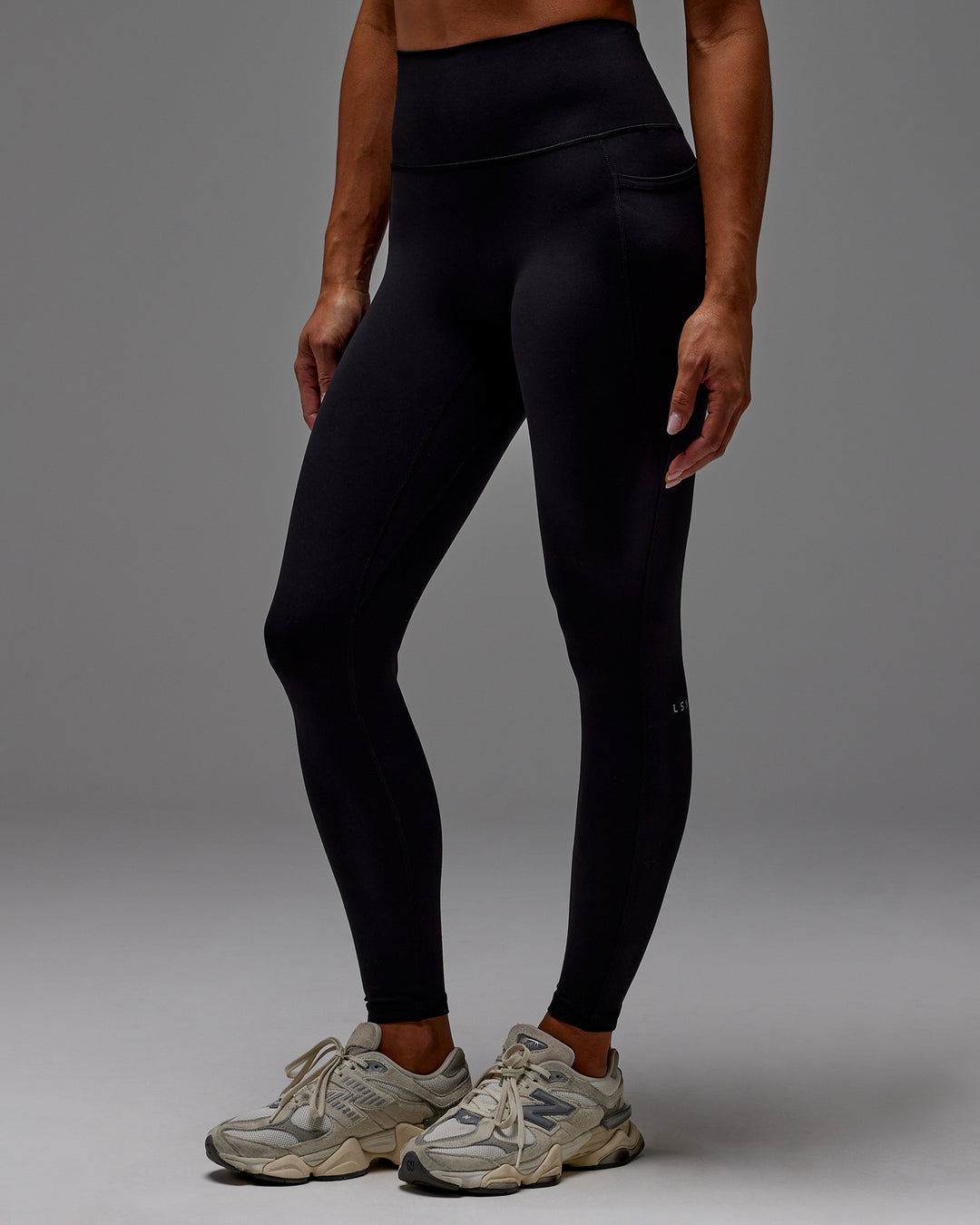 Woman wearing Fusion Ultra High-Rise Full Length Legging Pockets - Black | Model:Demi | Size:S