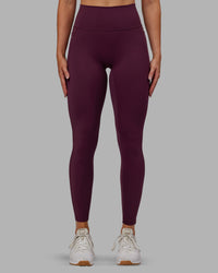 Woman wearing Fusion Ultra High-Rise Full Length Legging Pockets - Cherry Lacquer | Model:Paris | Size:S