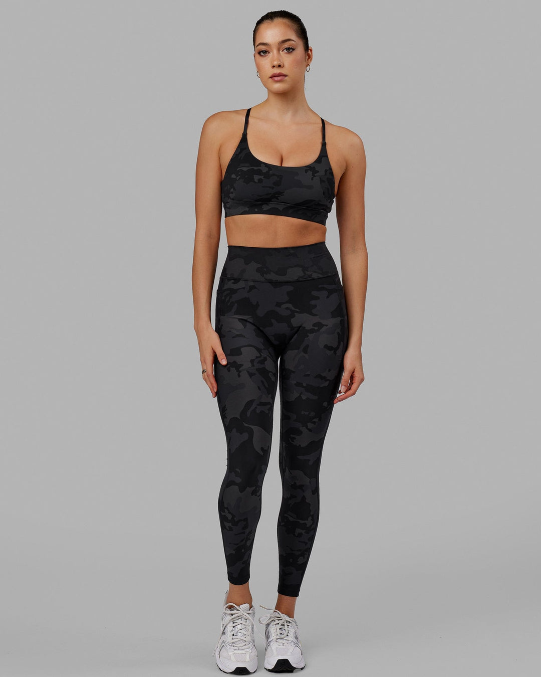 Woman wearing Fusion Ultra High-Rise Full Length Legging Pockets - Black Camo | Model:Katie | Size:S