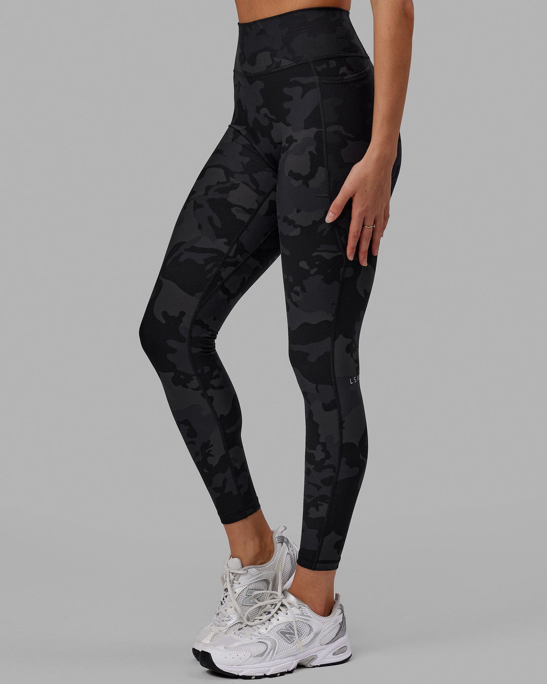 Woman wearing Fusion Ultra High-Rise Full Length Legging Pockets - Black Camo | Model:Katie | Size:S