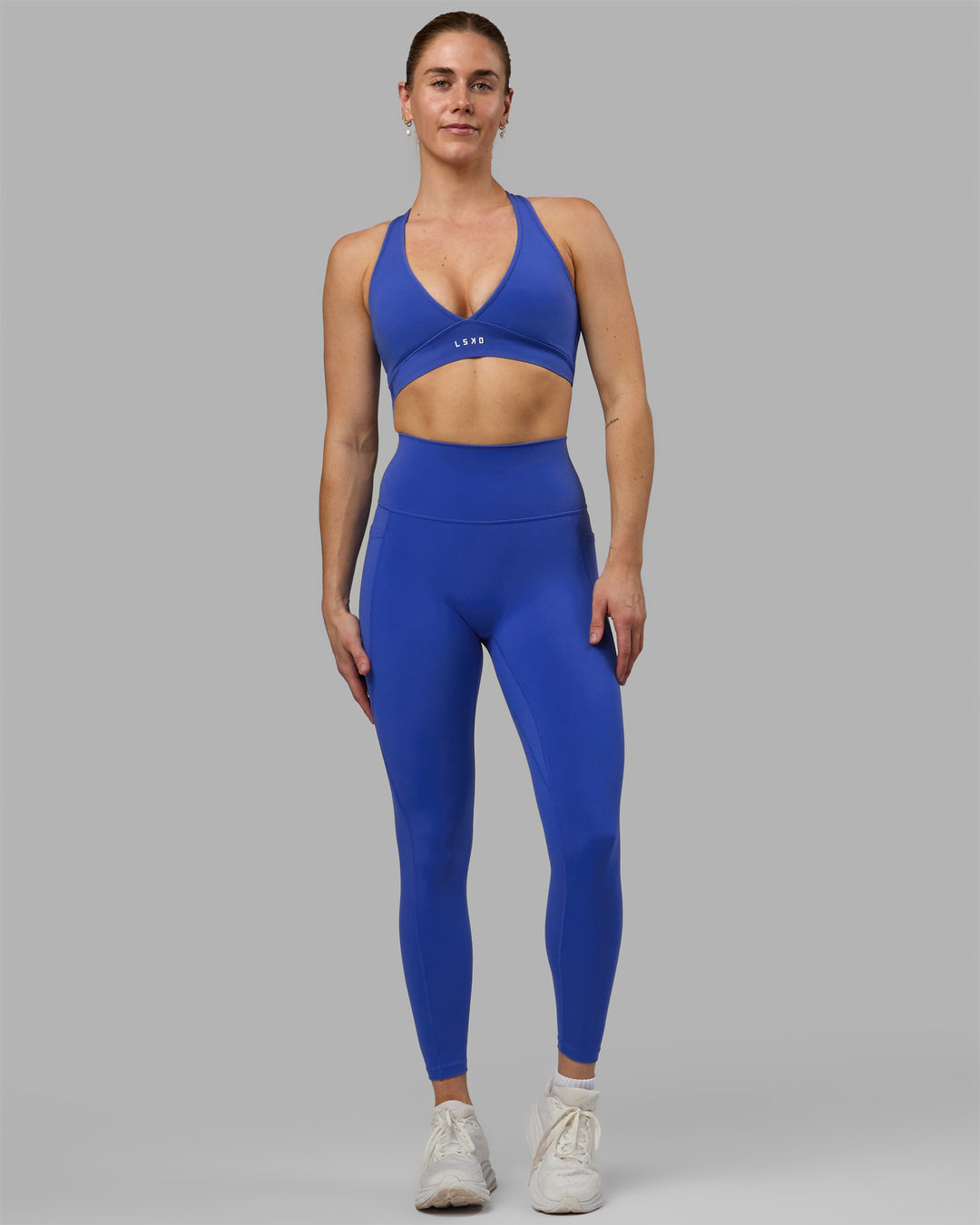 Woman wearing Fusion Ultra High-Rise Full Length Legging Pockets - Power Cobalt | Model:Hannah | Size:S