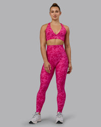 Woman wearing Fusion Ultra High-Rise Full Length Legging Pockets - Strawberry-Lava Lamp | Model:Zoe | Size:S