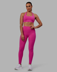 Woman wearing Fusion Ultra High-Rise Full Length Legging Pockets - Fuchsia Pink | Model:Sophie | Size:S