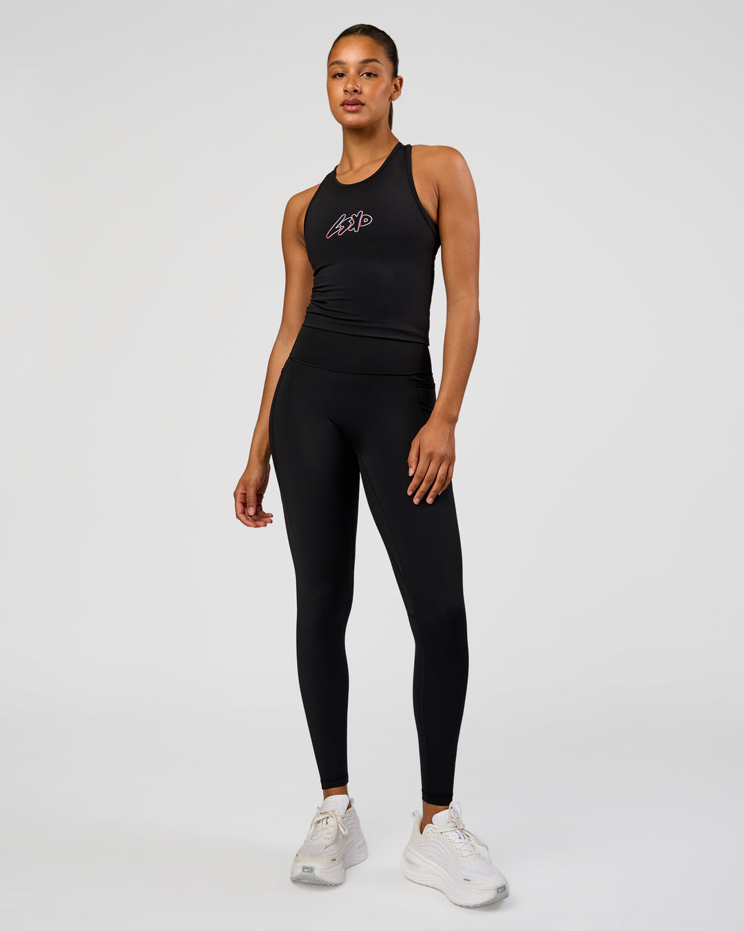 Woman wearing Fusion Graphic Ultra High-Rise Full Length Legging Pockets - Black-Radiate | Model:Rosie | Size:S - view 9