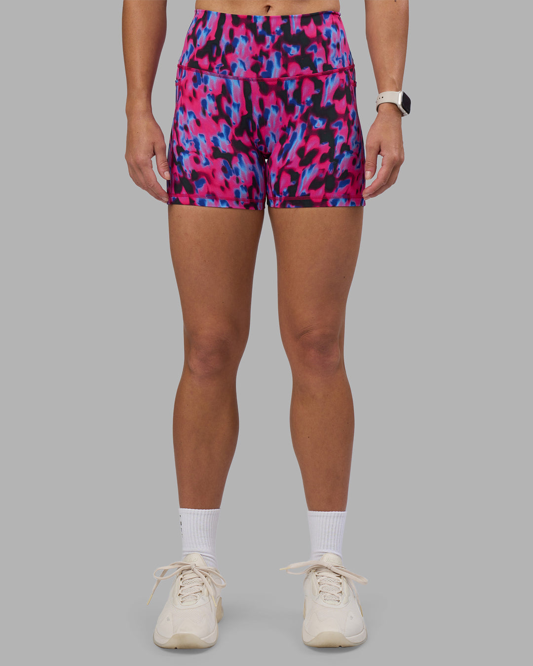 Woman wearing Fusion High-Rise 4&quot; Short Pockets - Pink Luminous | Model:Hannah | Size:S