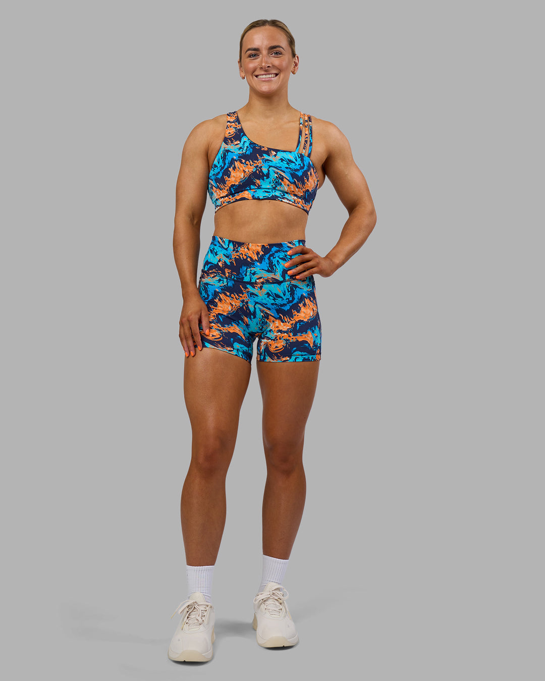 Woman wearing Fusion High-Rise 4&quot; Short Pockets - React Print | Model:Georgia | Size:S