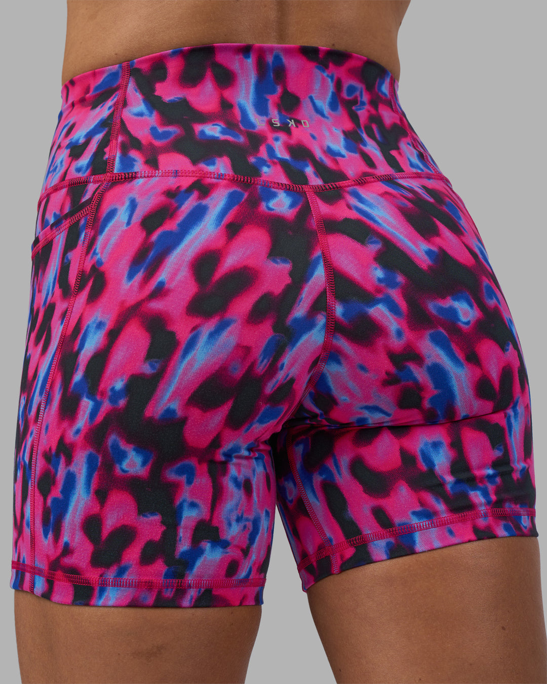 Woman wearing Fusion High-Rise 6&quot; Short Pockets - Pink Luminous | Model:Hannah | Size:S
