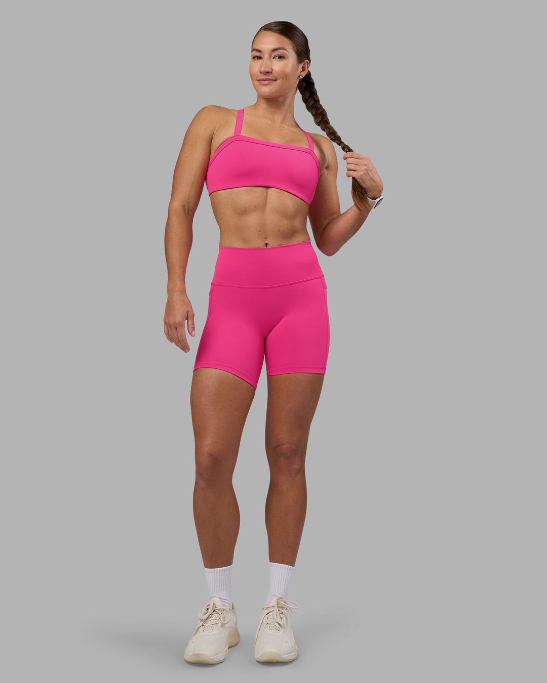 Woman wearing Fusion High-Rise 6&quot; Short Pockets - Ultra Pink | Model:Hannah | Size:S