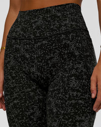 Woman wearing Fusion Icon Ultra High-Rise Full Length Legging Pockets - Energy Print Black-Reflective | Model:Amity | Size:S