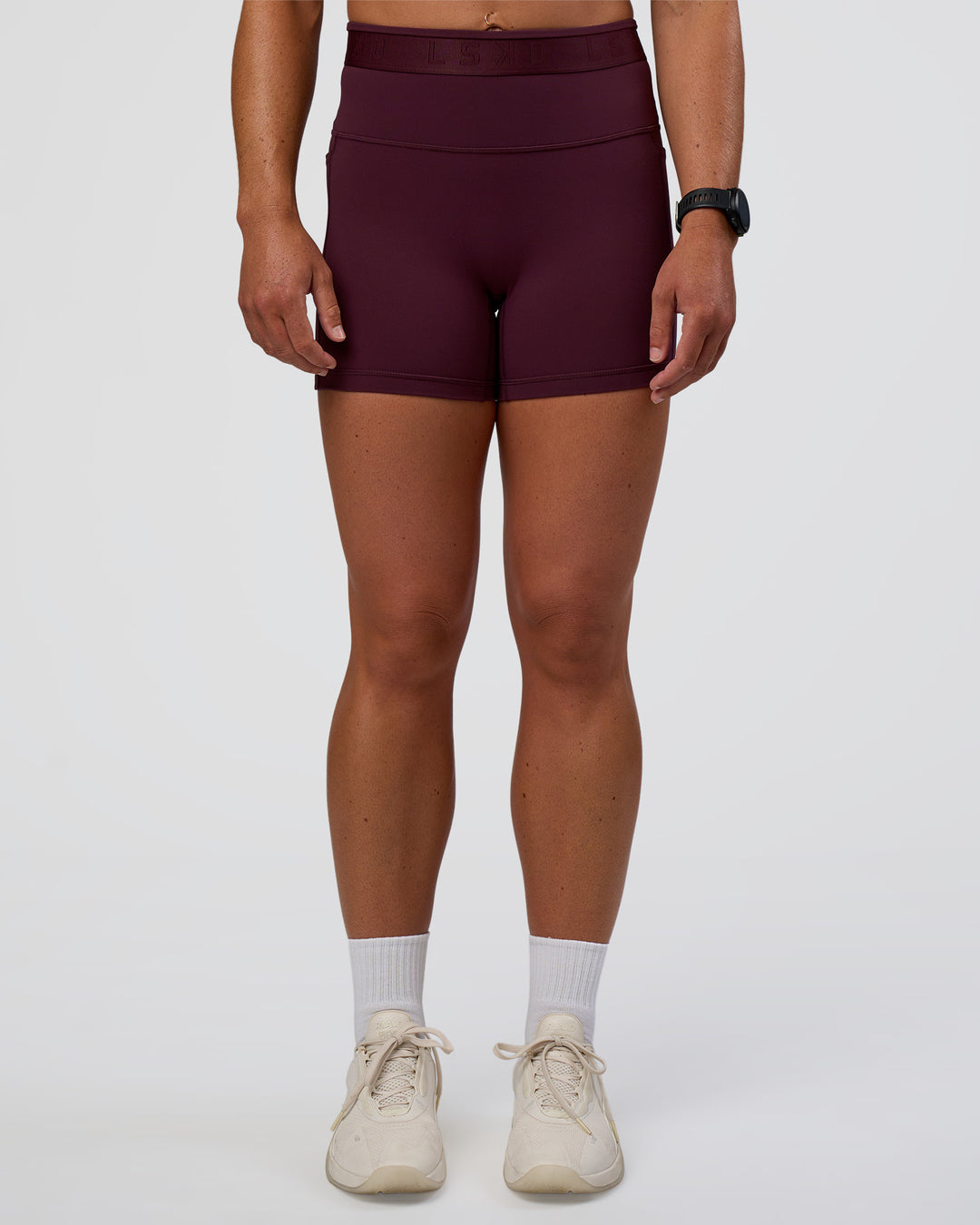 Woman wearing Fusion Jacquard High-Rise 4” Short Pockets - Cherry Lacquer | Model:Sav | Size:S