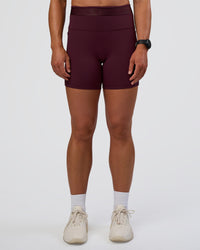 Woman wearing Fusion Jacquard High-Rise 6" Short Pockets - Cherry Lacquer | Model:Sav | Size:S