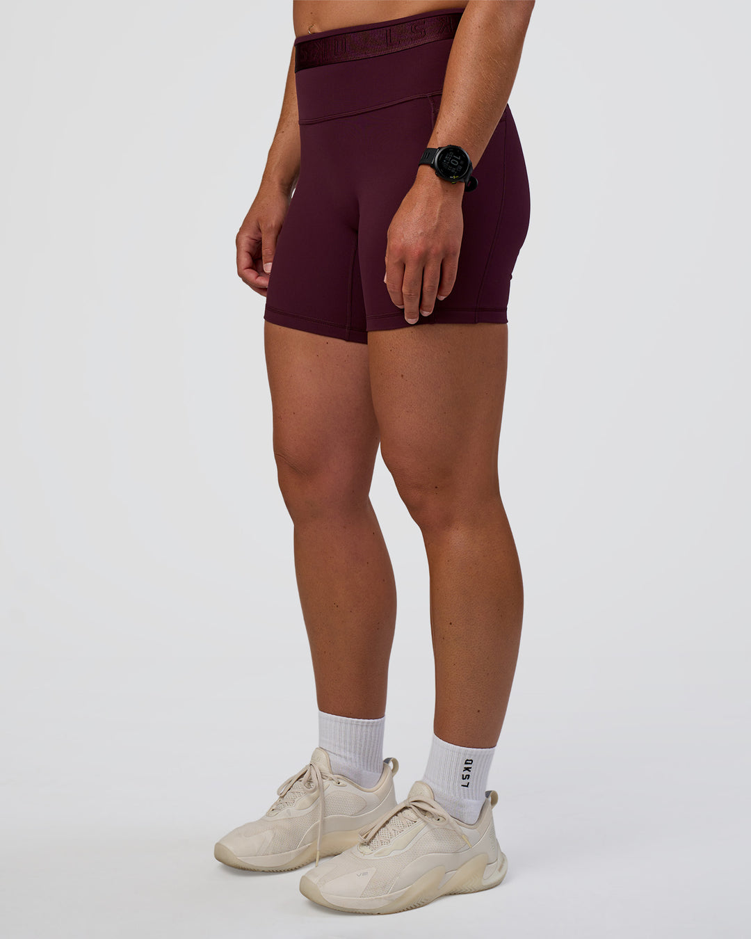 Woman wearing Fusion Jacquard High-Rise 6&quot; Short Pockets - Cherry Lacquer | Model:Sav | Size:S