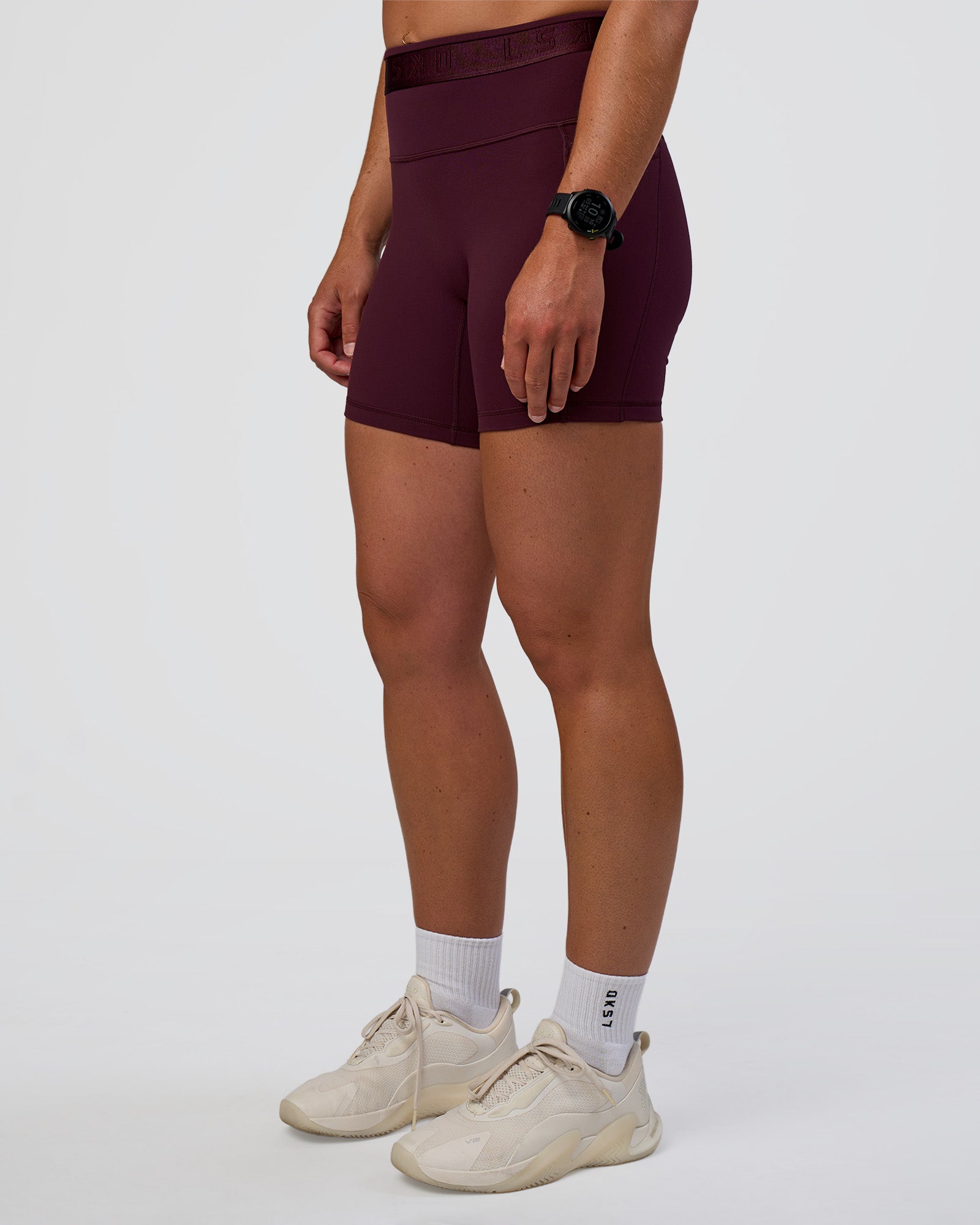 Woman wearing Fusion Jacquard High-Rise 6" Short Pockets - Cherry Lacquer | Model:Sav | Size:S