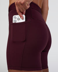 Woman wearing Fusion Jacquard High-Rise 6" Short Pockets - Cherry Lacquer | Model:Sav | Size:S