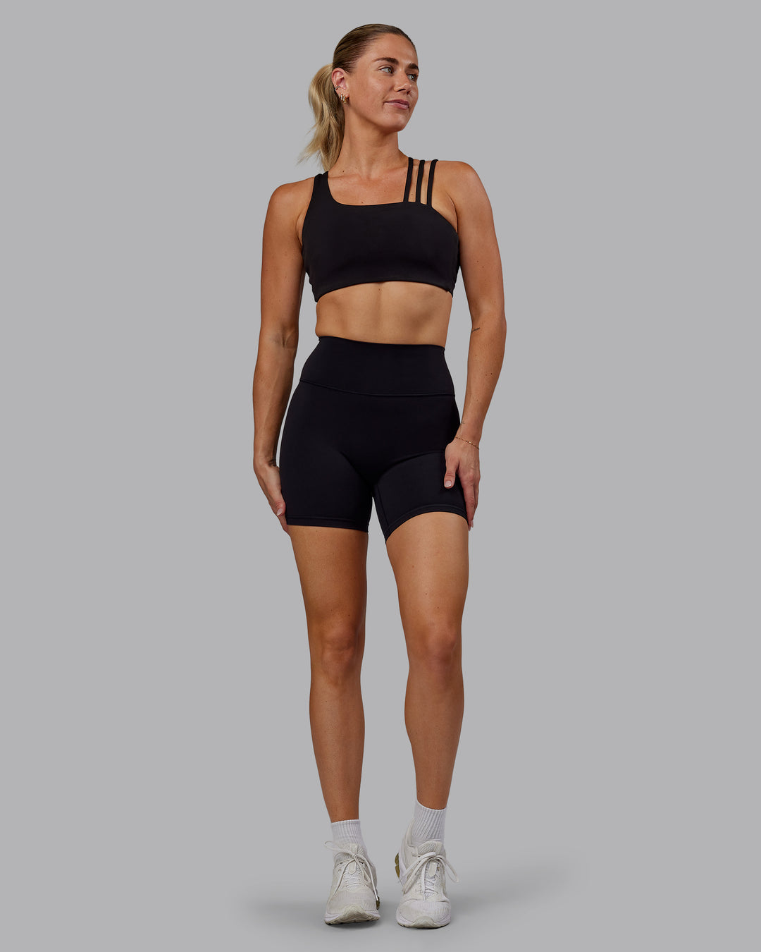 Woman wearing Fusion Ultra High-Rise 6&quot; Short - Black | Model:Hannah | Size:S