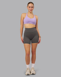 Woman wearing Fusion Ultra High-Rise 6" Short - Dark Storm | Model:Lillie | Size:S