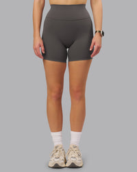 Woman wearing Fusion Ultra High-Rise 6" Short - Dark Storm | Set:true | Angle:front | Model:Lillie | Size:S