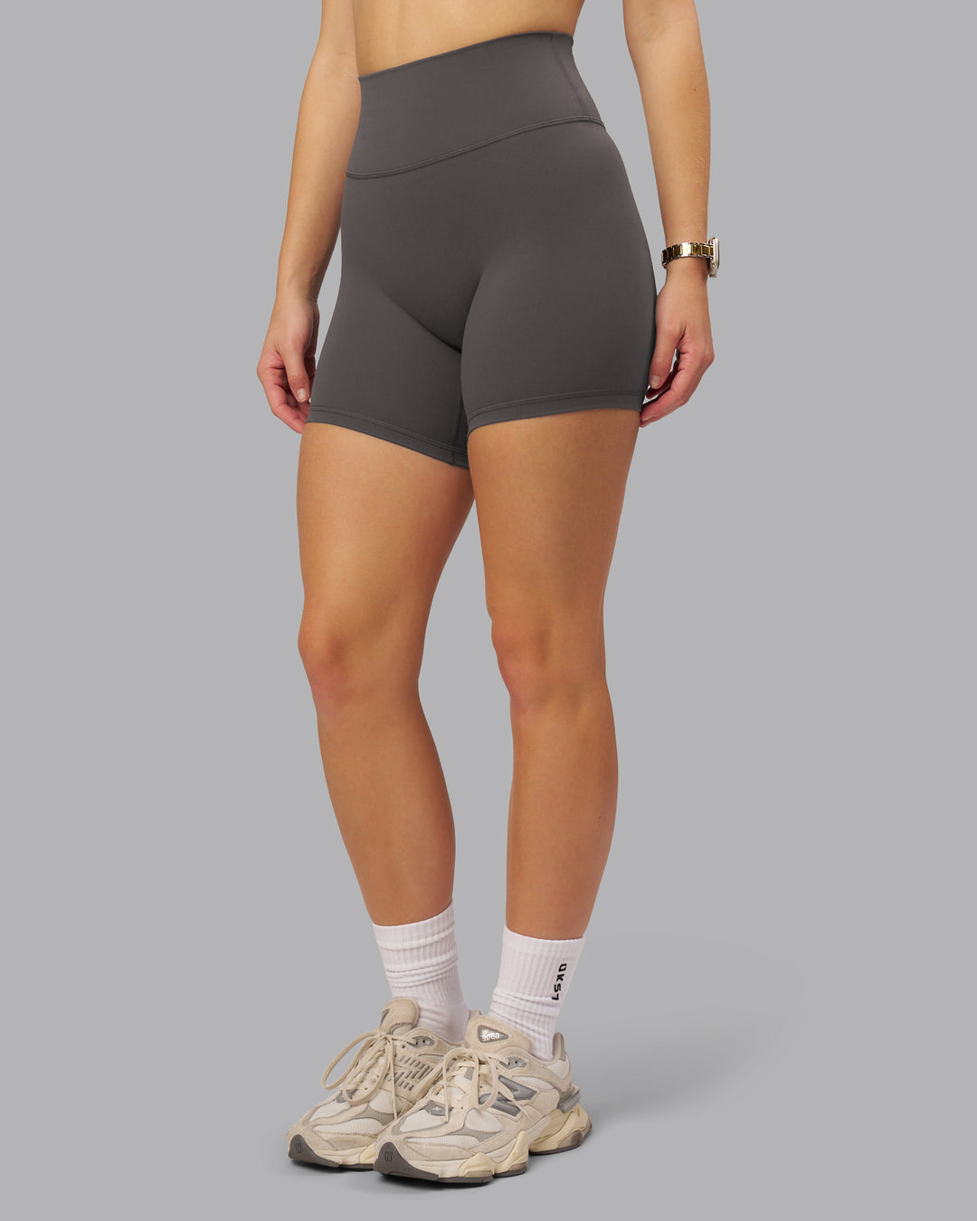 Woman wearing Fusion Ultra High-Rise 6&quot; Short - Dark Storm | Model:Lillie | Size:S