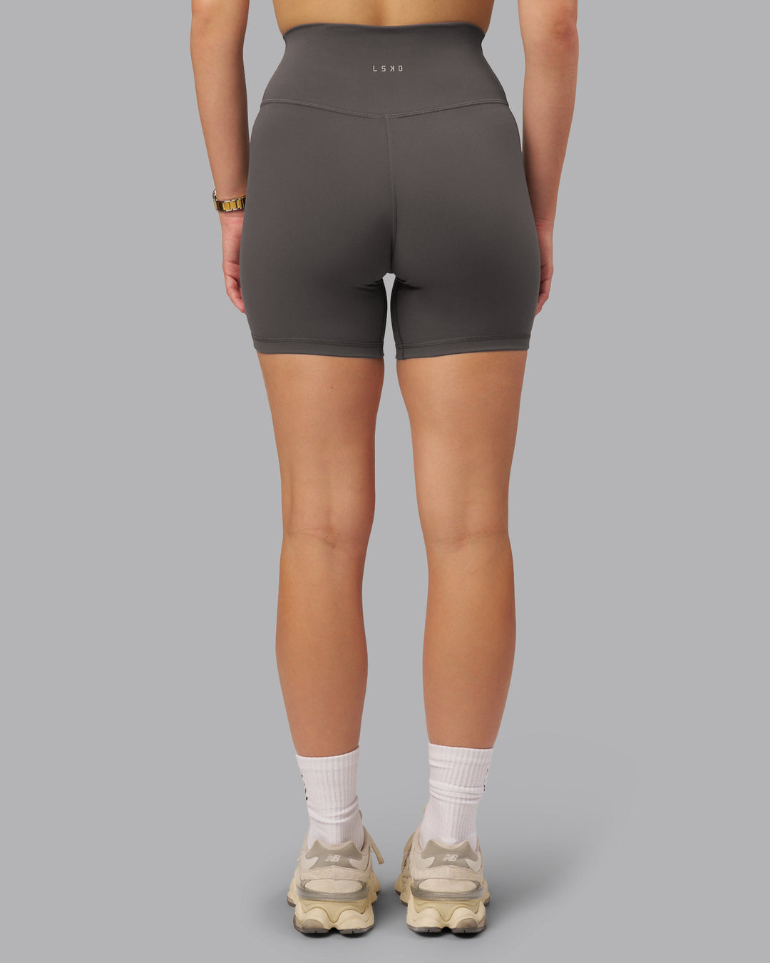 Woman wearing Fusion Ultra High-Rise 6&quot; Short - Dark Storm | Model:Lillie | Size:S