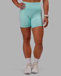 Woman wearing Fusion Ultra High-Rise 6" Short - Island Paradise | Model:Amber | Size:S