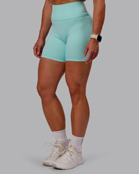 Woman wearing Fusion Ultra High-Rise 6" Short - Island Paradise | Model:Amber | Size:S