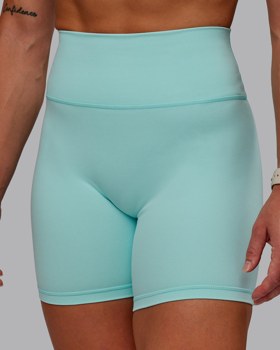 Woman wearing Fusion Ultra High-Rise 6&quot; Short - Island Paradise | Model:Amber | Size:S