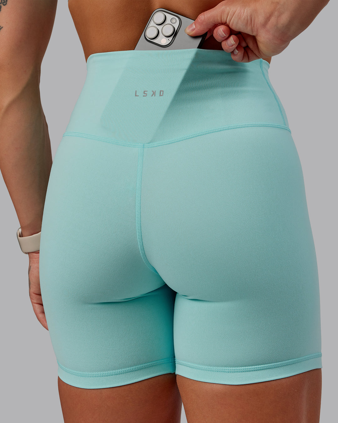 Woman wearing Fusion Ultra High-Rise 6&quot; Short - Island Paradise | Model:Amber | Size:S