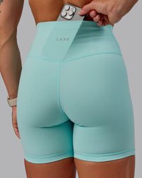 Woman wearing Fusion Ultra High-Rise 6" Short - Island Paradise | Model:Amber | Size:S