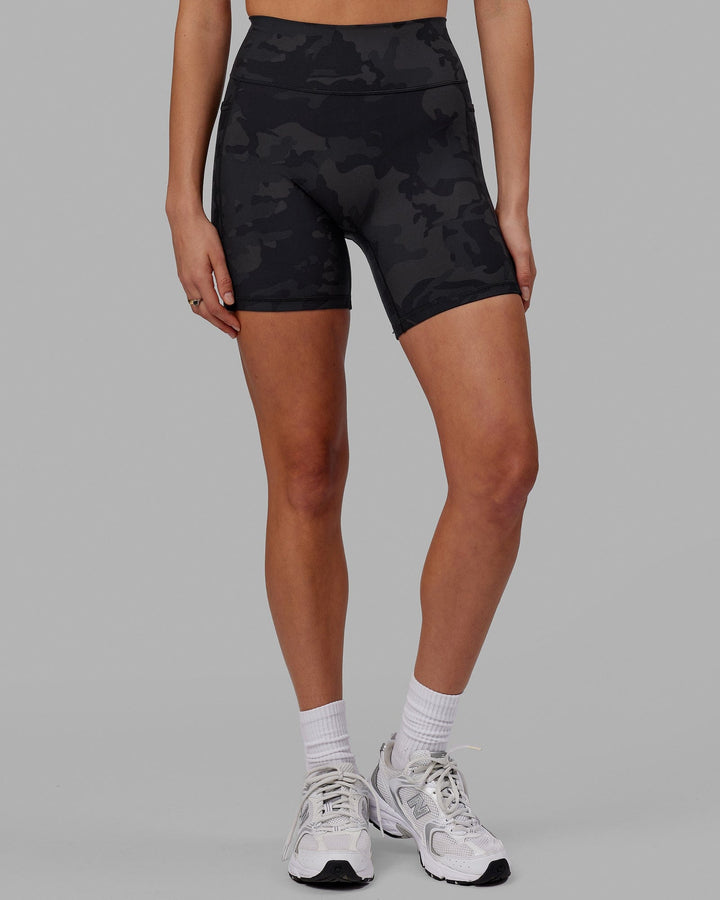 Woman wearing Fusion Mid Short Tight - Black-Camo