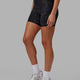 Woman wearing Fusion Mid Short Tight - Black-Camo