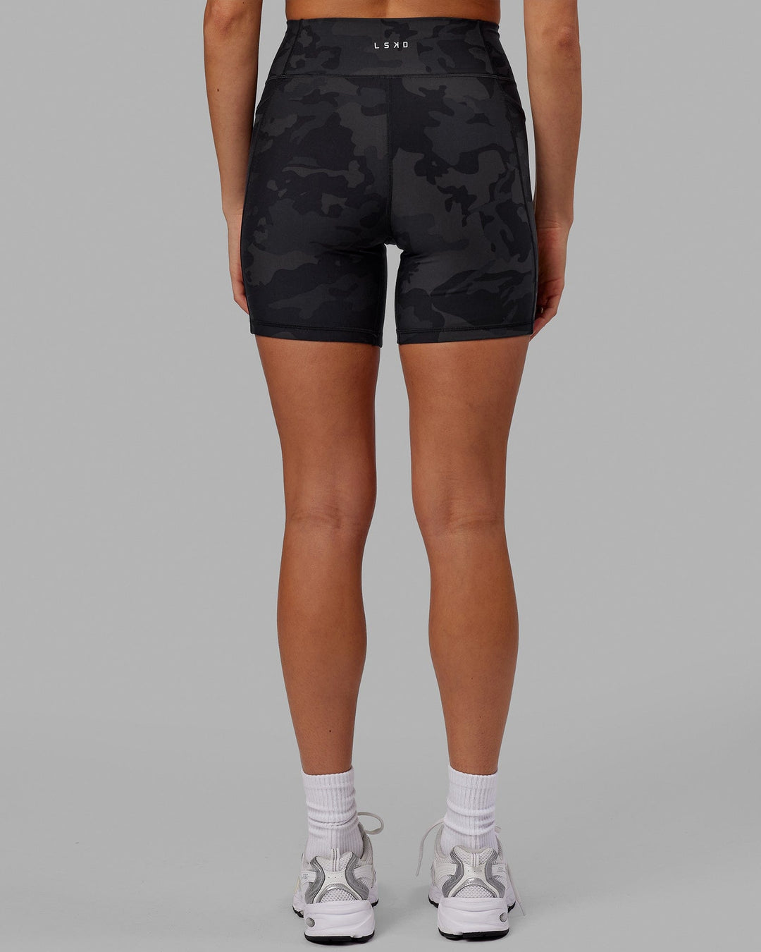 Woman wearing Fusion Mid Short Tight - Black-Camo