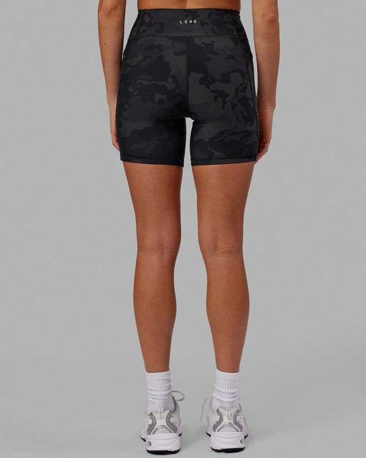 Woman wearing Fusion Mid Short Tight - Black-Camo