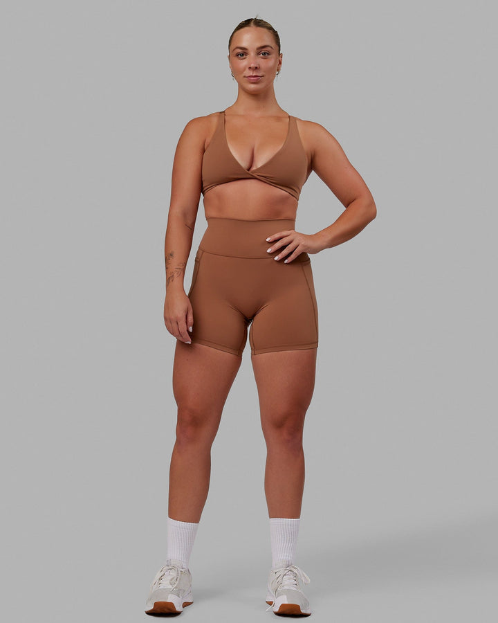 Woman wearing Fusion Mid Short Tights - Brick