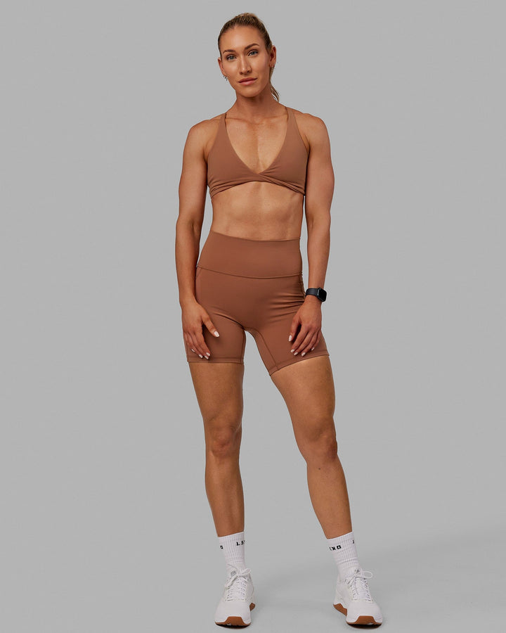 Woman wearing Fusion Mid Short Tights - Brick