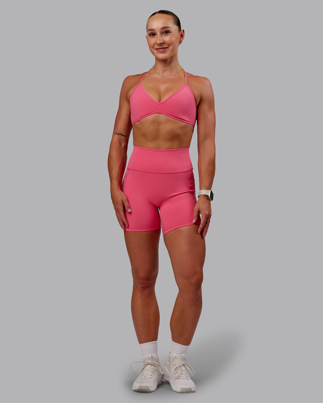 Woman wearing Fusion Ultra High-Rise 6&quot; Short Pockets - Hot Pink | Model:Amber | Size:S