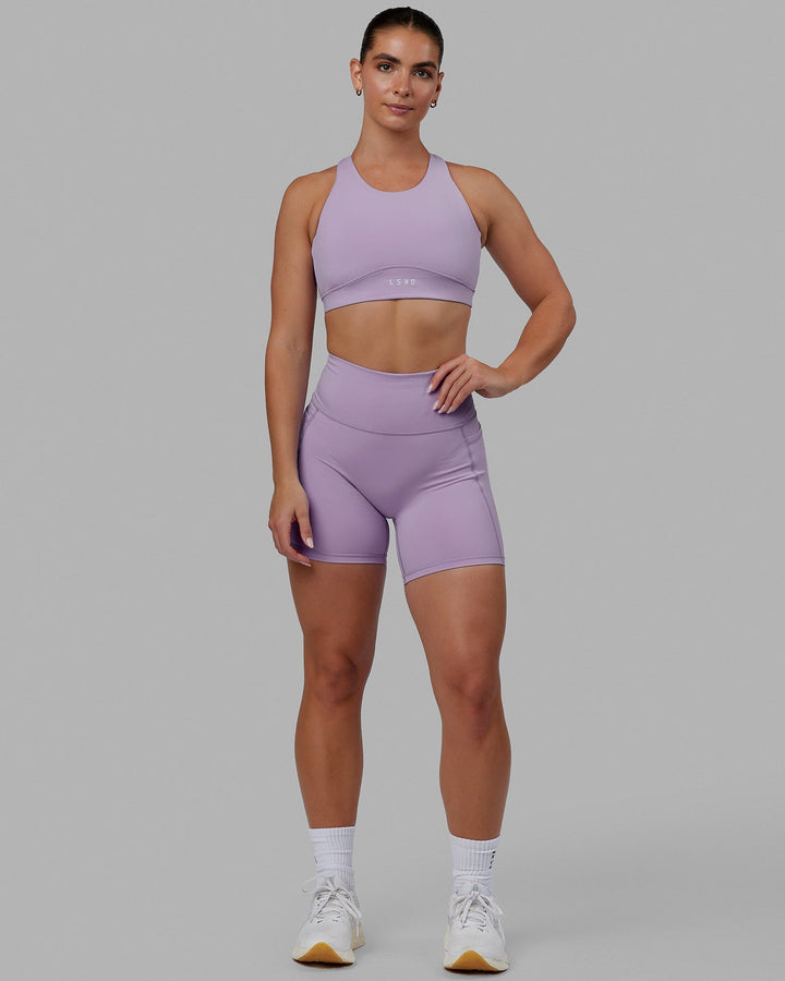 Woman wearing Fusion Sports Bra - Pale Lilac