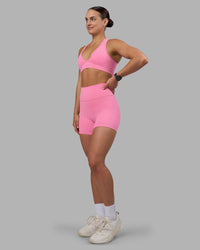 Woman wearing Fusion Ultra High-Rise 4" Short - Candy Pink | Model:Keisha | Size:S