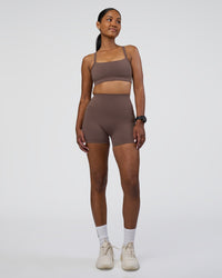 Woman wearing Fusion Ultra High-Rise 4" Short Pockets - Peppercorn | Model:Rica | Size:S