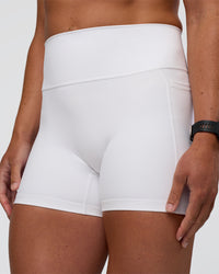 Woman wearing Fusion Ultra High-Rise 4" Short Pockets - White | Model:Sav | Size:S