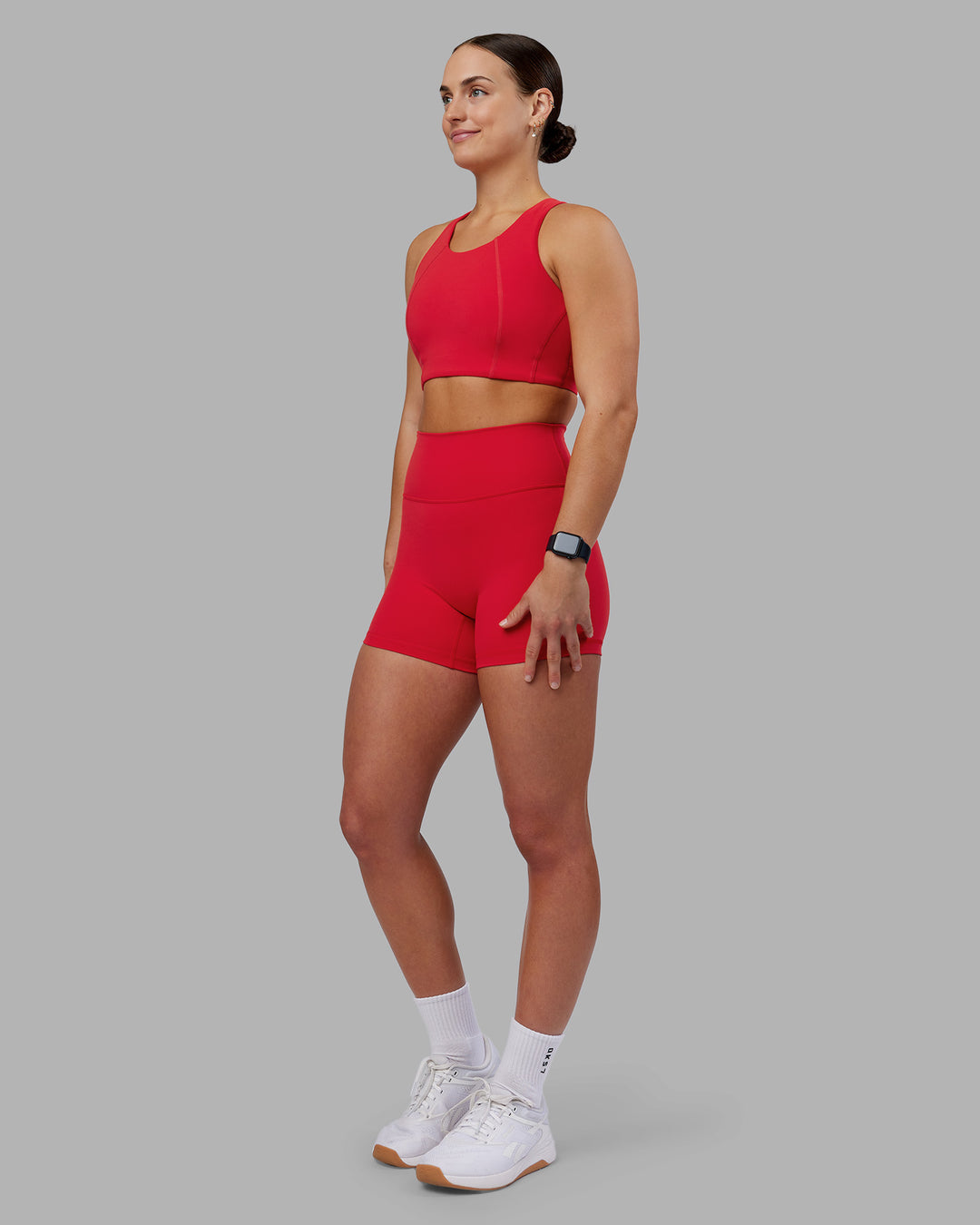Woman wearing Fusion Ultra High-Rise 4&quot; Short - Scarlet | Model:Keisha | Size:S