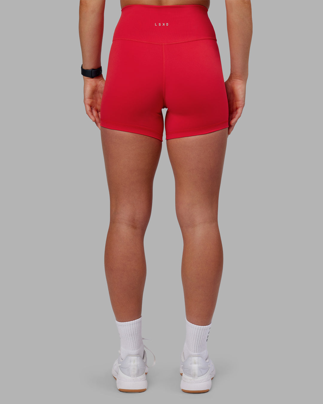 Woman wearing Fusion Ultra High-Rise 4&quot; Short - Scarlet | Model:Keisha | Size:S